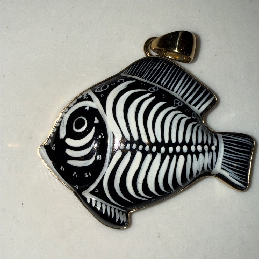 Black and White Sugar Fish Pendant Necklace won’t tarnish